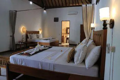 Family room with two beds and warm lighting